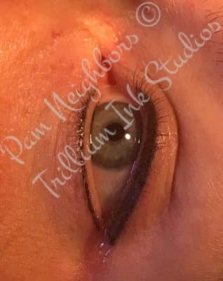 woman with eyeliner permanent makeup
